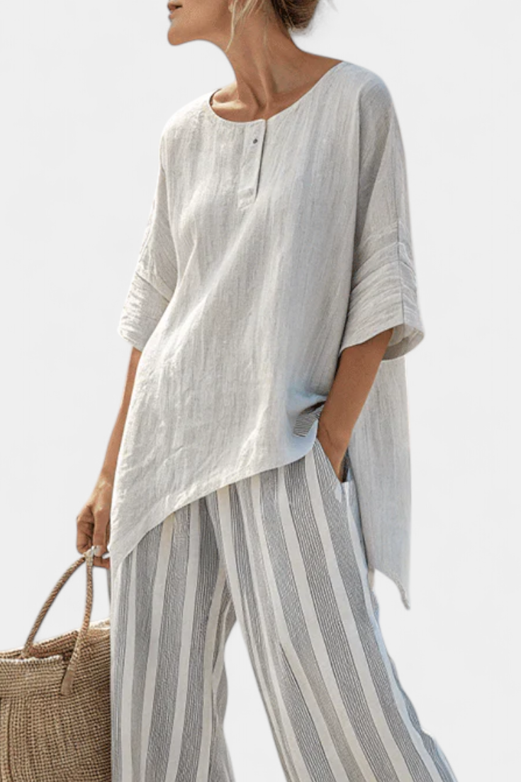Daisy Set with Asymmetric Blouse and Striped Pants for a Modern and Elegant Style