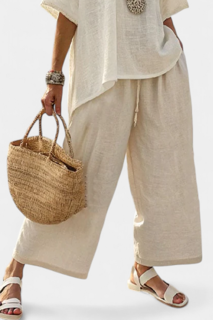 Overall Minimalist Daisy in Natural Shades with Oversized Blouse and Wide Pants for a Simple and Elegant Style