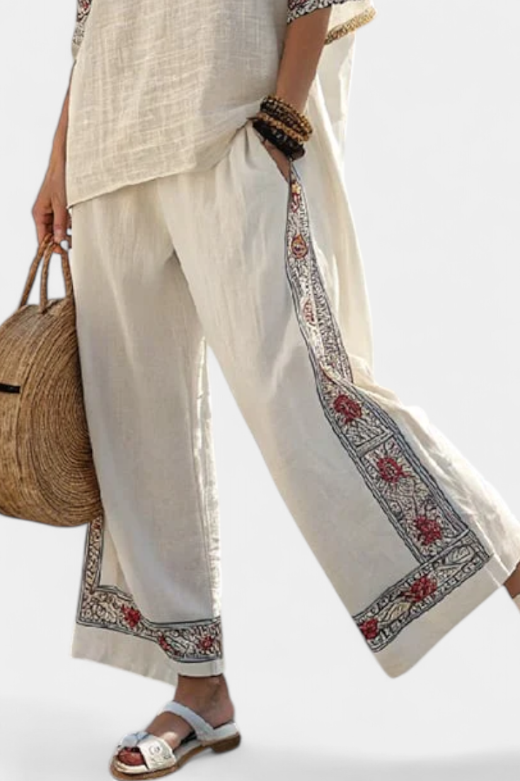 Composition of Mediterranean Daisy in bamboo linen with elegant red and green stripes