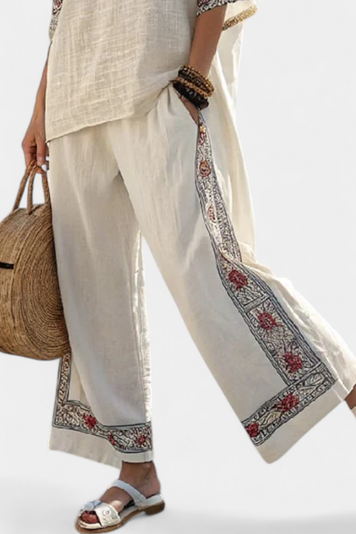 Composition of Mediterranean Daisy in bamboo linen with elegant red and green stripes