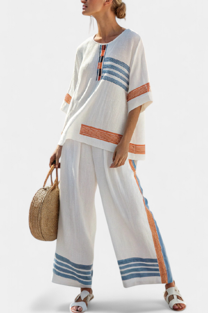 Daisy set in white with details in blue and orange – unique and vibrant design