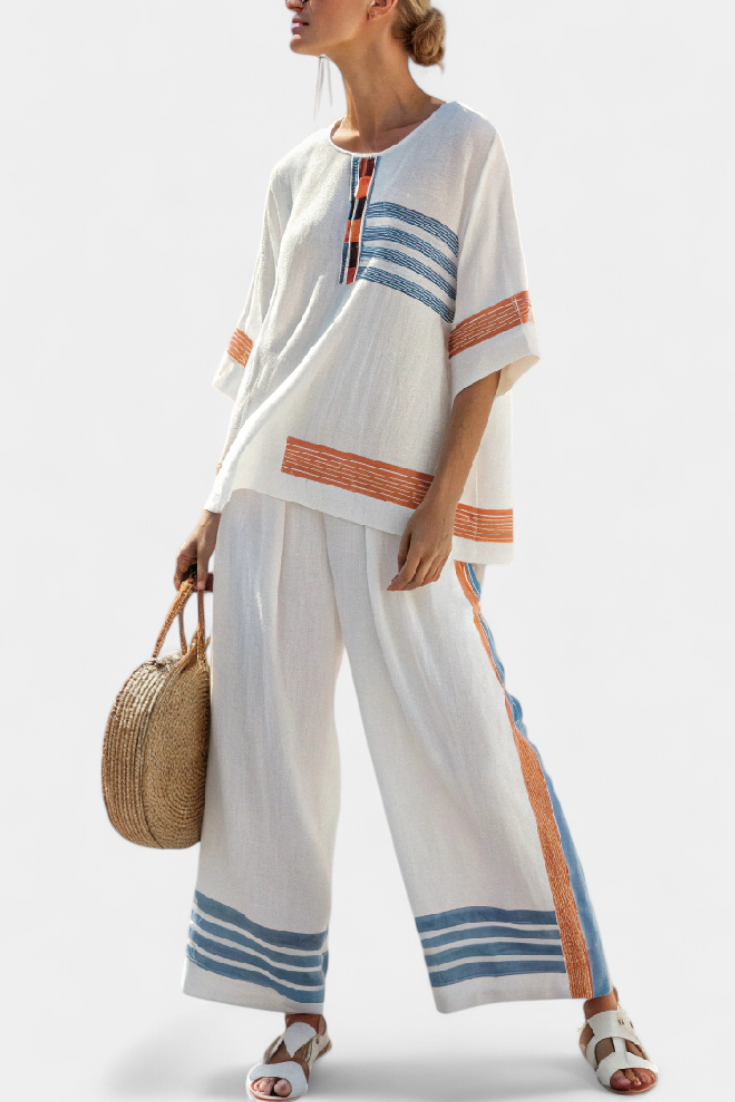 Daisy set in white with details in blue and orange – unique and vibrant design