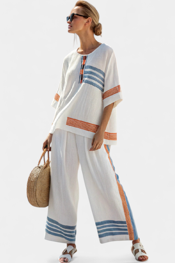 Daisy set in white with details in blue and orange – unique and vibrant design